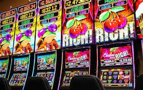 nikeslot platform interface showing Liga 1 markets, live-dealer tables, and slot games